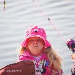 Girl at the kids fishing derby 2025